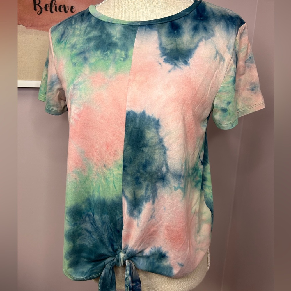 2 Women’s short sleeve tie dye tops. Both size medium.